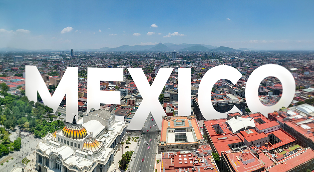 A cityscape with a prominent background city and the text 'Mexico'.